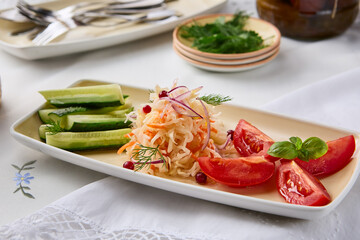 Elegant Assorted Pickles Platter with Cabbage, Cucumbers, and Tomatoes - Rustic Light and Warm Tones