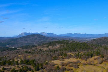 Forest covered landscape in Notranjska, Slovenia and Nanos plateau