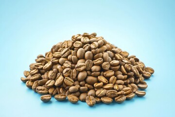 Obraz premium Roasted coffee beans in bulk on a blue background.