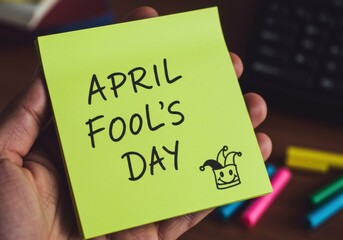 April fool's day note with hand-drawn jester hat on sticky note