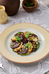 Rustic Salad with Roasted Beetroot, Cheese, and Pine Nuts on Lace Tablecloth