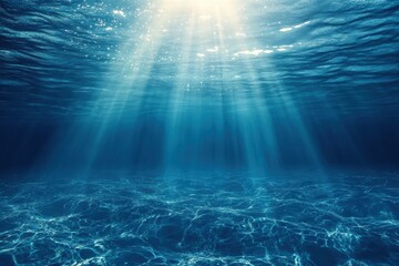 Fototapeta premium Sunlight beams through ocean water creating a serene underwater scene