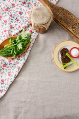 Rustic Russian Style Linen Background with Pickles and Fresh Herbs