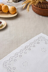 Rustic Elegance Lace Doily and Linen Table Setting in Soft Earth Tones