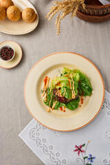 Gourmet Beefsteak with Fresh Lettuce Rustic Elegance in Earthy Tones