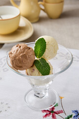 Elegant Ice Cream Scoop Display in a Classic Glass Dish