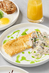Elegant Omelet with Mushroom Cream Sauce in Soft Natural Lighting