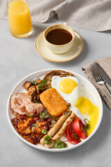 Gourmet Morning Grilled Sausages and Eggs with a Rustic Breakfast Plate