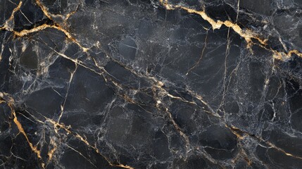 A deep black stone background with fine grain texture, providing an elegant, modern aesthetic for design projects.
