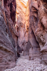 Deep Slot Canyon with Towering Sandstone Walls