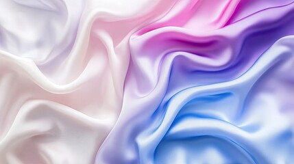Obraz premium A soft, silky smooth satin fabric with gentle folds and a gradient of deep blue, purple, and pink, perfect for elegant designs.
