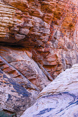 Striated Rock Layers in Shades of Red and Purple