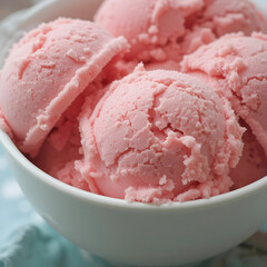 Closeup shot of a bowl with scoops of pink ice cream