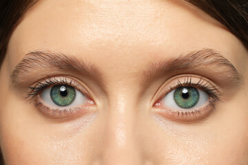 Closeup view of woman with green eyes
