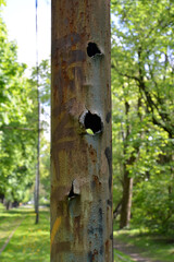 Fragmentation holes in the metal support of the contact tram network. Kaliningrad
