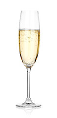 Champagne in glass isolated on white. Sparkling wine