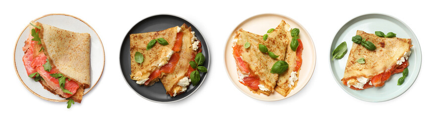 Delicious crepes with salmon and cream cheese isolated on white, set. Top view
