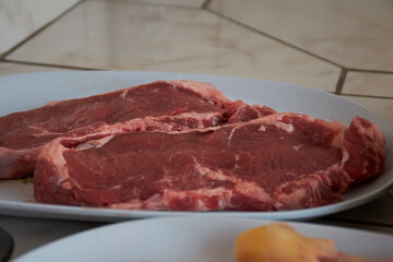 Raw beef steaks with marbled texture for BBQ cooking