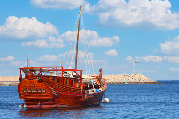 Obraz premium Oman, a Dhow is a traditional sailing vessel typical of some arab countries