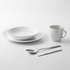 Ceramic tableware and cutlery on a white background