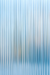 Obraz premium Abstract background with reeded ribbed glass effect texture 