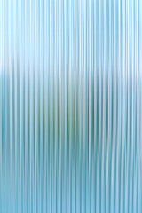Obraz premium Abstract background with reeded ribbed glass effect texture 