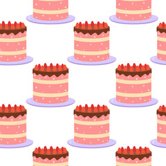 Bright pink cakes with chocolate frosting and strawberries on display for a festive event