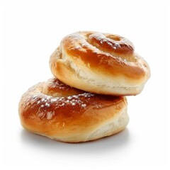 Two delicious spiral buns covered with icing sugar, creating a tempting treat