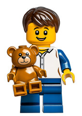 Naklejka premium Lego figure kid with teddy bear
