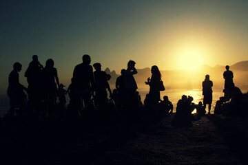Fototapeta premium silhouettes of people at sunset