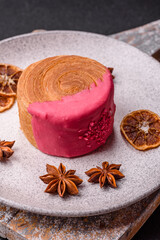 Round sweet New York roll croissant with raspberry cream filling