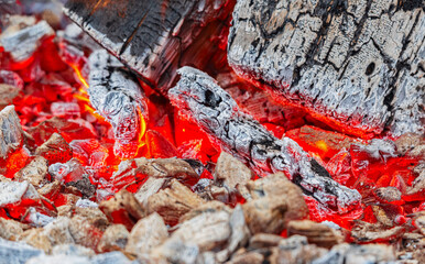 hot, sparkling red embers in a fire