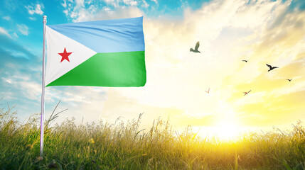 Djibouti flag textile cloth fabric waving on the top sunrise mist fog