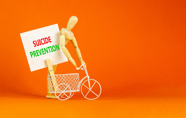 Suicide prevention symbol. Concept words Suicide prevention on beautiful white paper on clothespin....