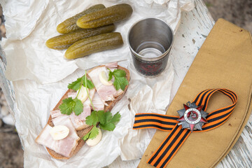 glass of vodka and a snack of lard and cucumber, February 23, Defender of the Fatherland Day, grandfather's awards, St. George's ribbon, Order of the Great Patriotic War,translation,
