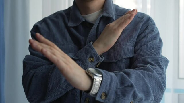Hand gesture "stop, don't do this" A man is trying to stop someone. Gesticulation with hands
