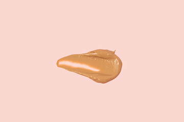 Brown cream texture on pink background