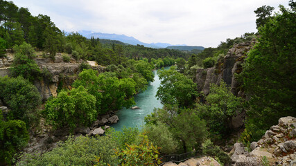 Obraz premium Koprulu Canyon, located in Antalya, Turkey, is one of the most important tourism places in the country. Rafting is a popular sport.