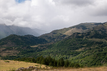 Naklejka premium mountain landscape with clouds