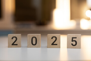 wooden cubes with the text 2025