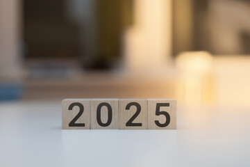 wooden cubes with the text 2025