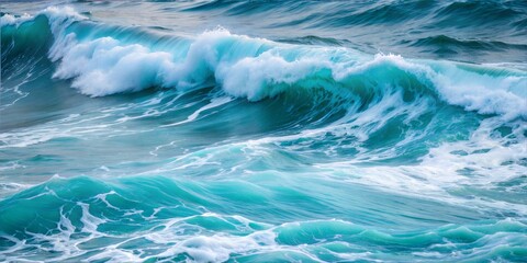 Fototapeta premium Beautiful ocean waves crashing against each other in vibrant turquoise colors 