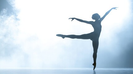 Obraz premium Silhouette of a ballet dancer in motion on a plain white background