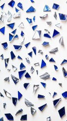 Obraz premium Shattered Blue Glass on White Background: Abstract Art