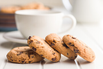 Chocolate chip cookies on white table.
