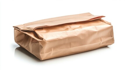 Fresh vegetables such as onions, potatoes, lemons, peppers, and green veggies are displayed in a paper bag on a light background