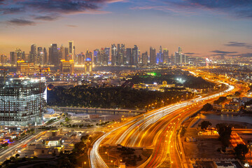 Obraz premium Aerial View of Doha Skyline from Lusail. Katara Lusail express way