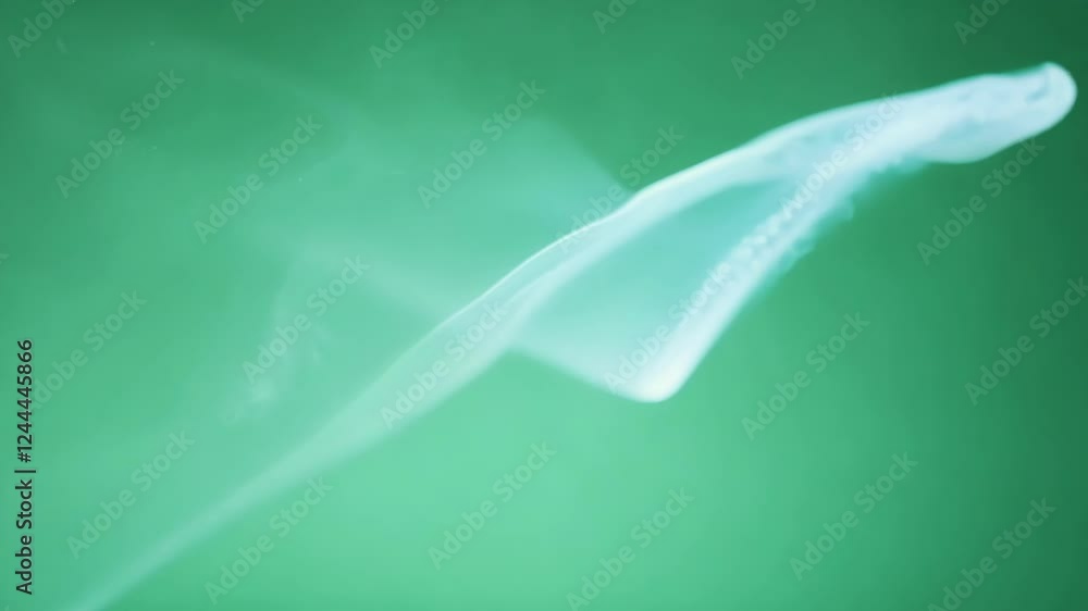 Aufkleber luminous edges of the vapor catch light creating a serene atmosphere. green screen chromakey