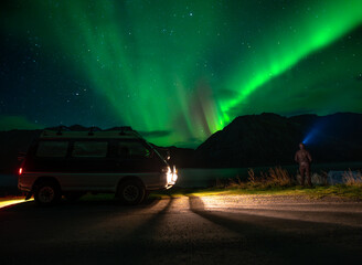 Campervan under the northern lights.