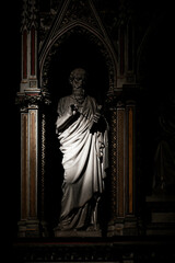 shadow and light - statue in a church